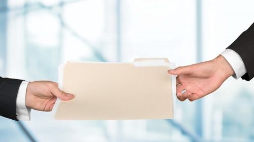 partnership-teamwork-concept-two-men-documents_488220-5755